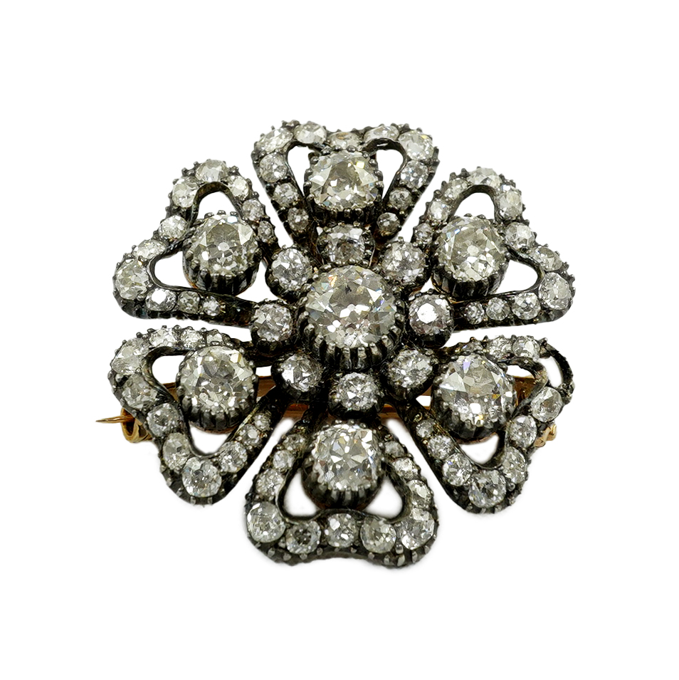 A Victorian gold, silver and diamond cluster set pendant brooch